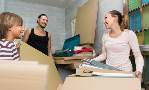 Professional house movers preparing a move in Hanworth residential street
