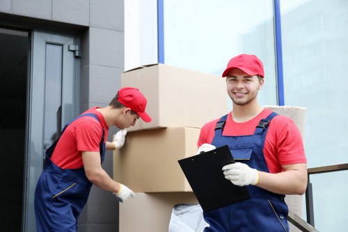 Removal van and moving boxes for a house move in Hanworth