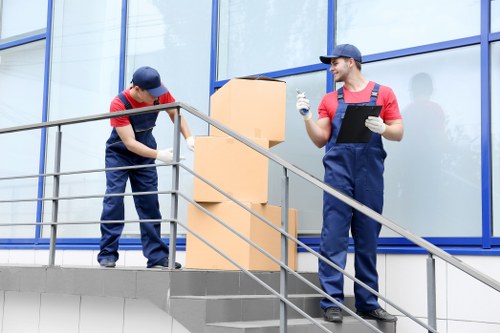 Worker using protective materials to prevent property damage