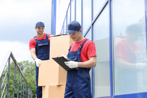Man and van loading furniture for a local Hanworth move