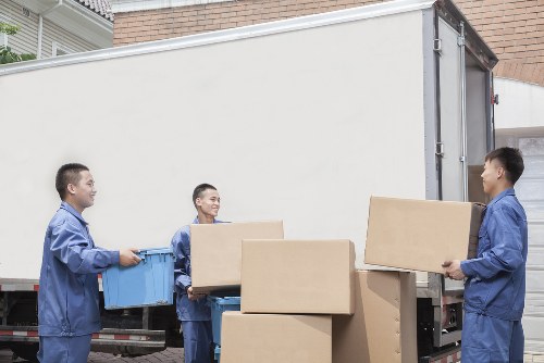 Removal staff loading commercial contents for a local move