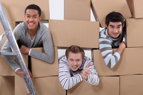 Office removals planning in Hanworth with packed boxes and moving equipment