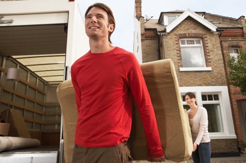 Boxes and furniture arranged for house removals in Hanworth