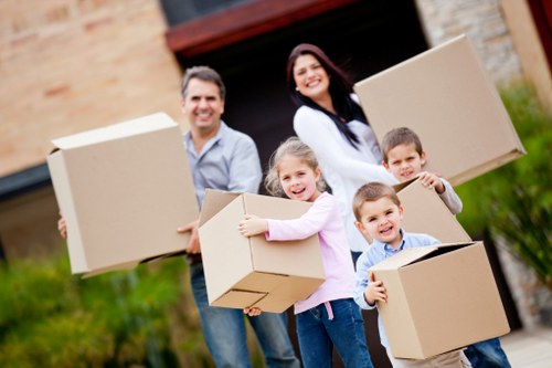 Unpacking and organising boxes in a new Hanworth home after moving day