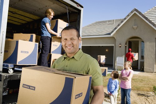 Van removals service handling boxes and furniture in Hanworth